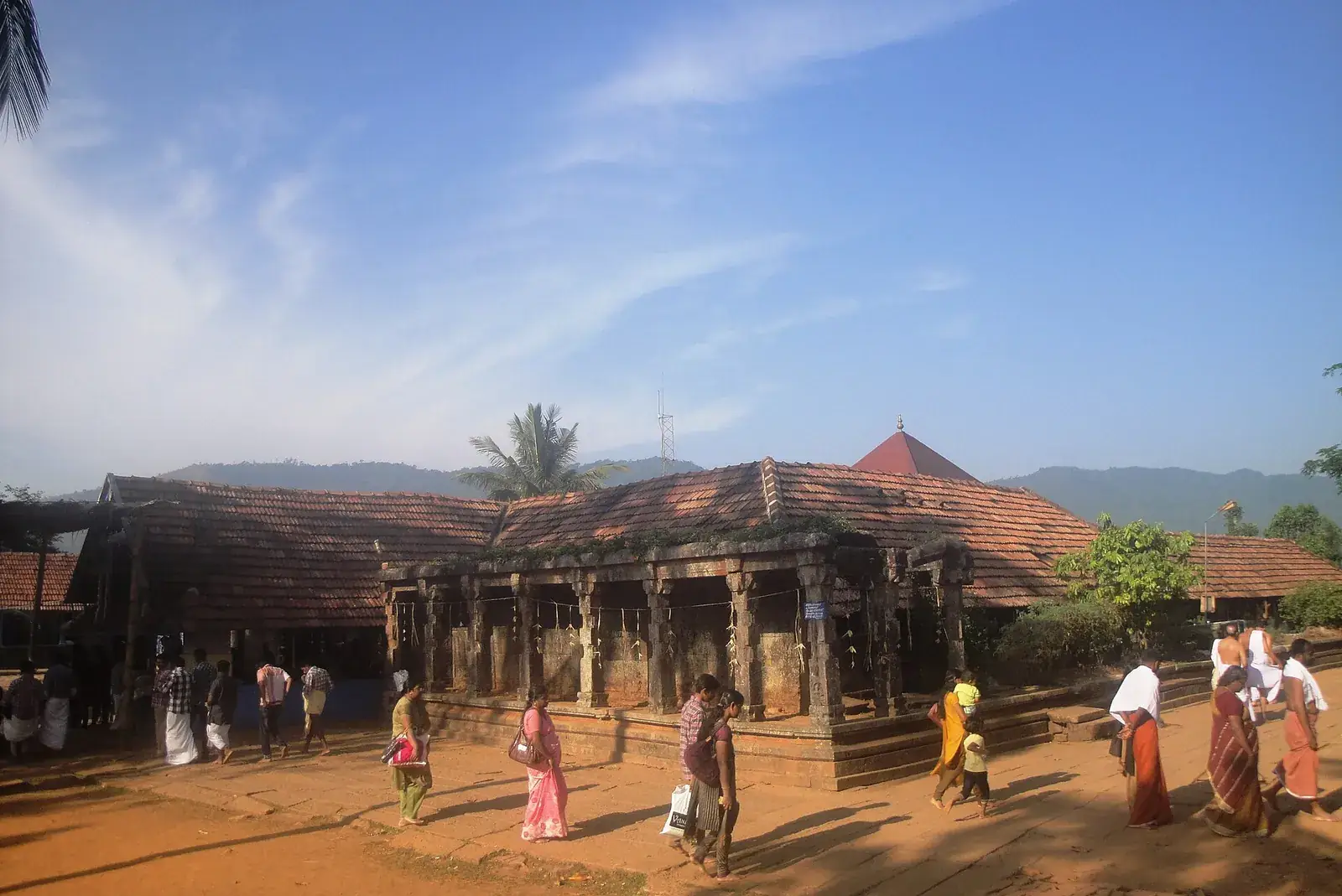 The temple courtyard at Thirunelli, with its tiled roofs and stone walls